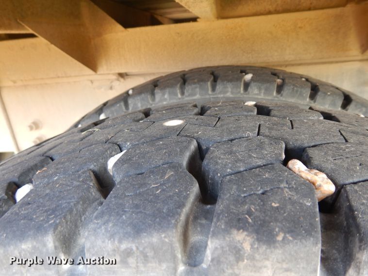 image for item HN9359 2002 Sterling L-Line  flatbed truck