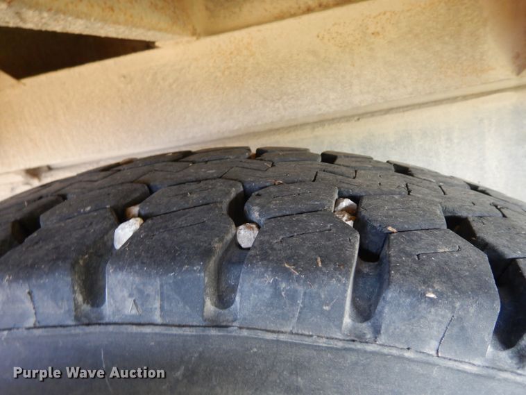 image for item HN9359 2002 Sterling L-Line  flatbed truck