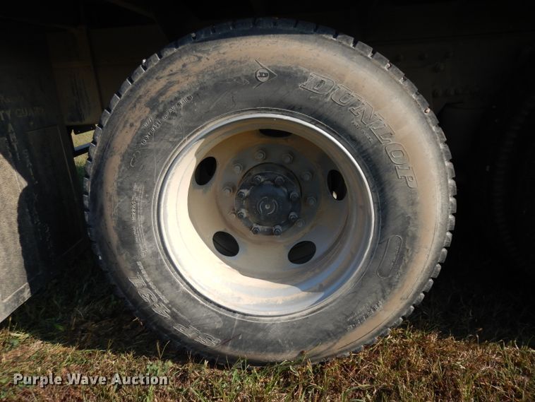 image for item HN9359 2002 Sterling L-Line  flatbed truck