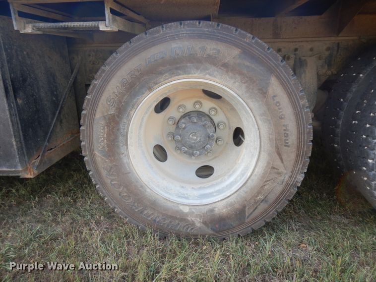 image for item HN9359 2002 Sterling L-Line  flatbed truck