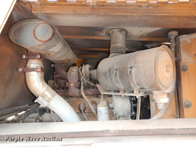 image for item DJ6904 1985 Case 1085B  wheeled excavator