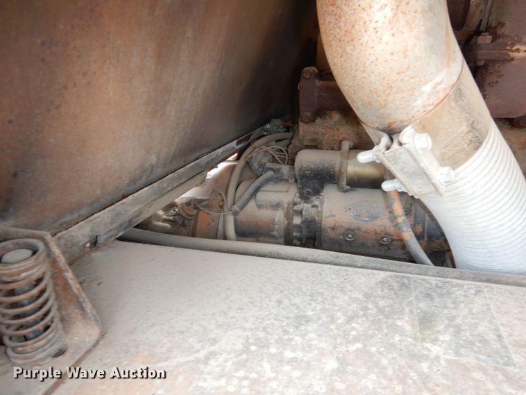 image for item DJ6904 1985 Case 1085B  wheeled excavator