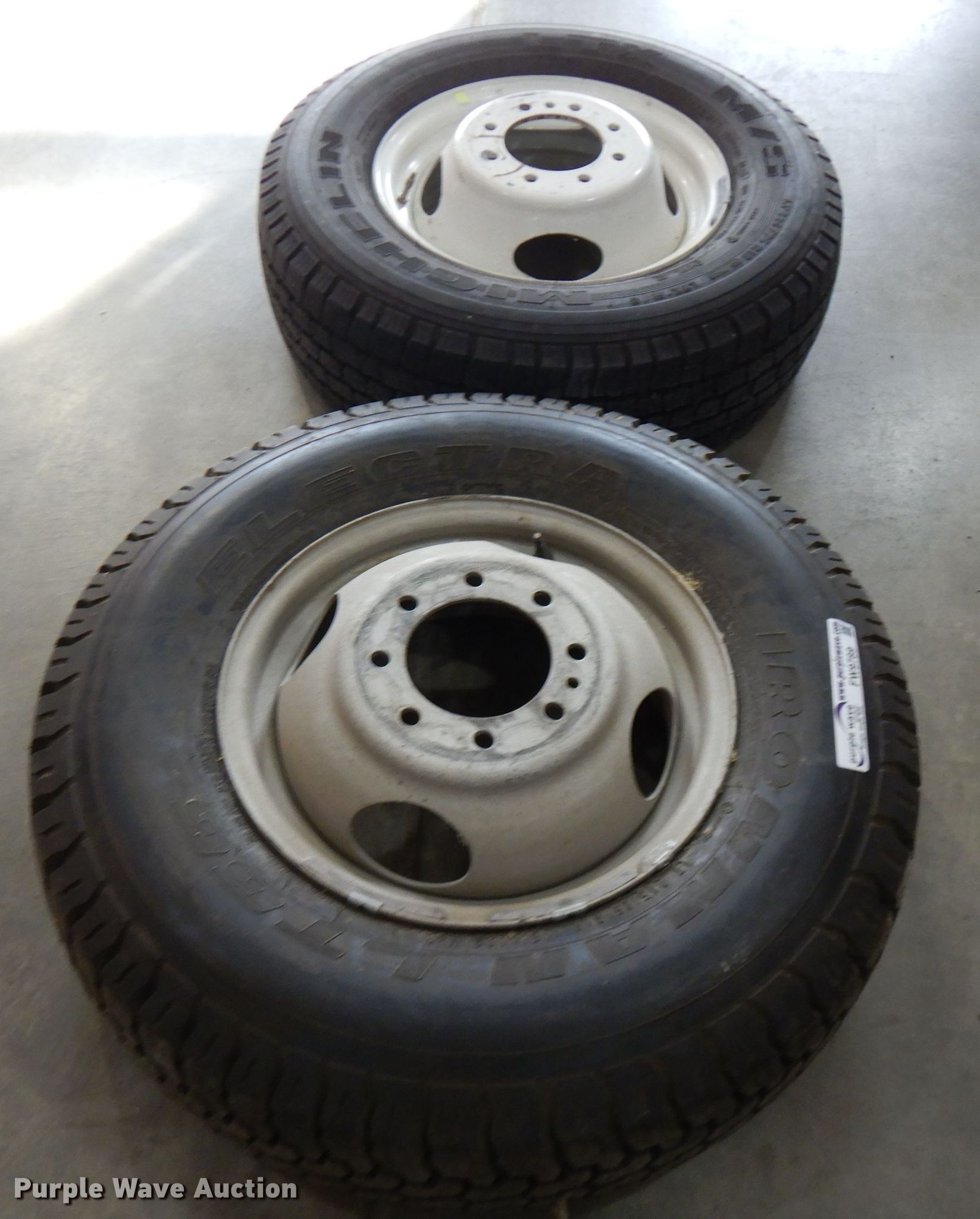(2) tires and wheels in Neodesha, KS Item FW9789 sold Purple Wave