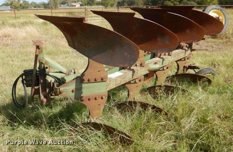 image for item DH5390 John Deere E835A four bottom rollover plow