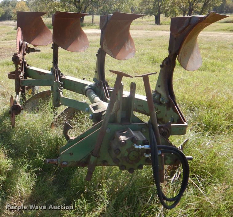 image for item DH5390 John Deere E835A four bottom rollover plow