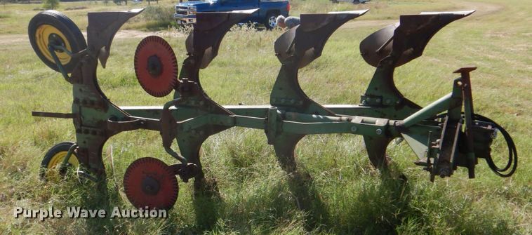 image for item DH5390 John Deere E835A four bottom rollover plow