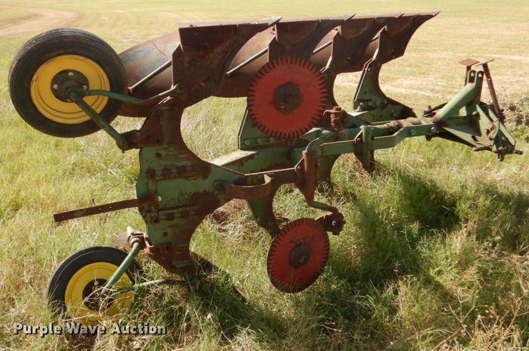 image for item DH5390 John Deere E835A four bottom rollover plow