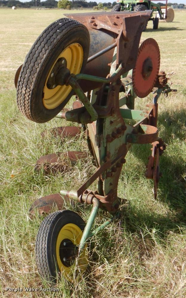 image for item DH5390 John Deere E835A four bottom rollover plow