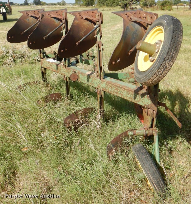 image for item DH5390 John Deere E835A four bottom rollover plow