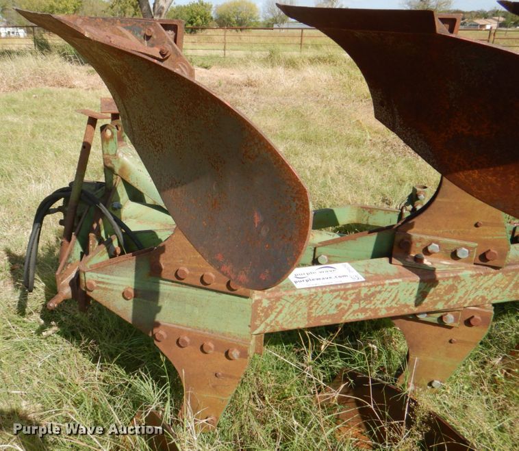 image for item DH5390 John Deere E835A four bottom rollover plow