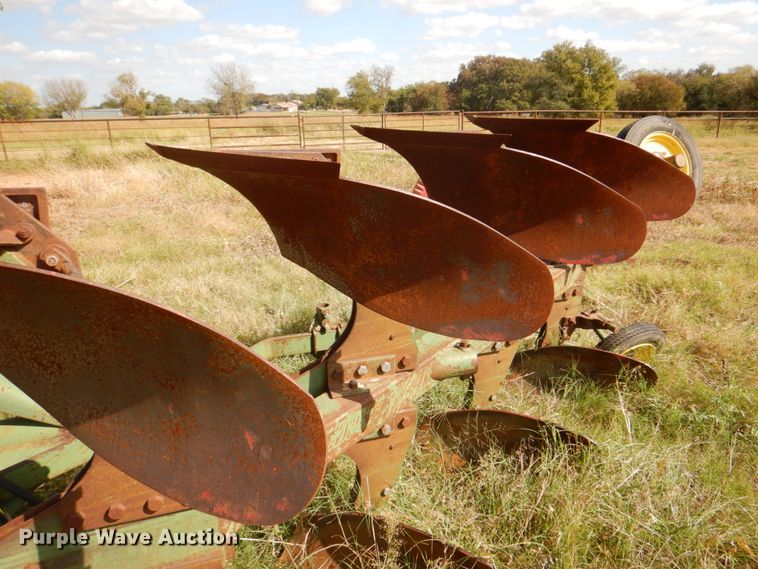 image for item DH5390 John Deere E835A four bottom rollover plow