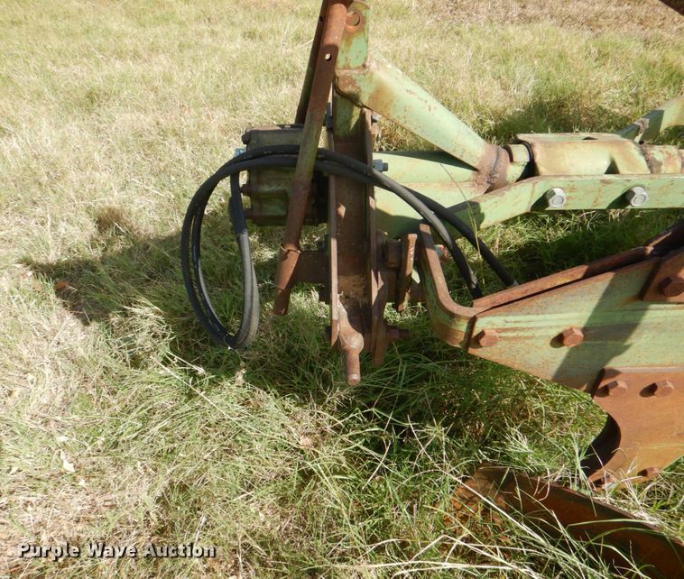 image for item DH5390 John Deere E835A four bottom rollover plow