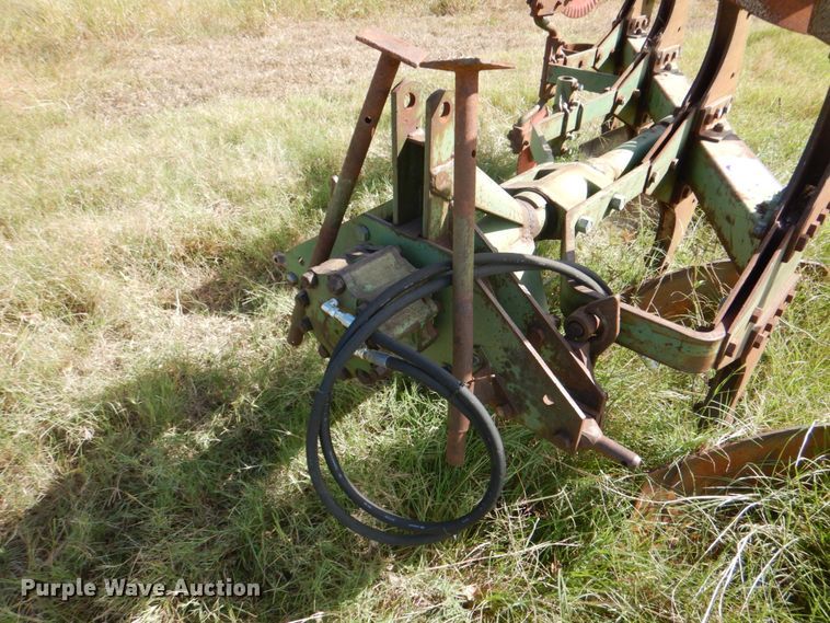 image for item DH5390 John Deere E835A four bottom rollover plow