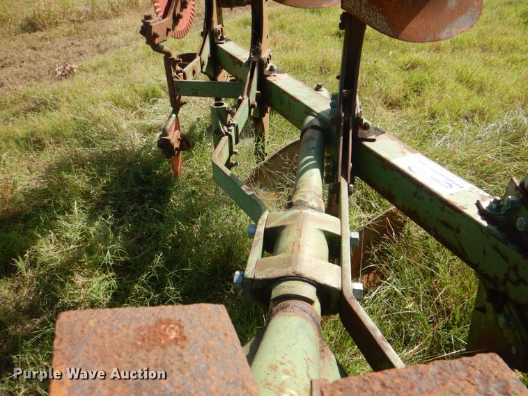 image for item DH5390 John Deere E835A four bottom rollover plow