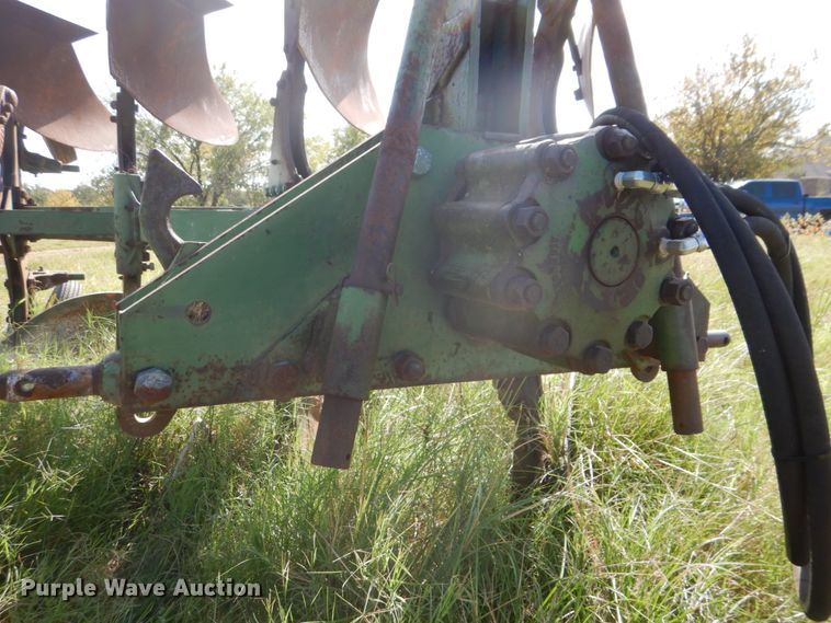 image for item DH5390 John Deere E835A four bottom rollover plow