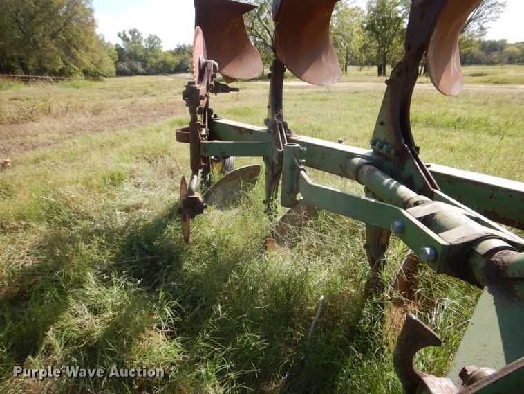 image for item DH5390 John Deere E835A four bottom rollover plow