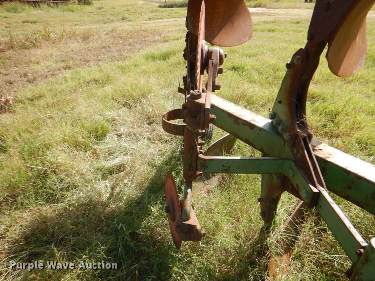 image for item DH5390 John Deere E835A four bottom rollover plow