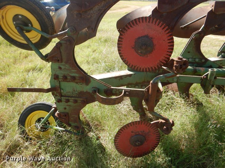 image for item DH5390 John Deere E835A four bottom rollover plow