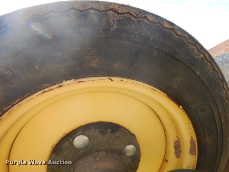 image for item DH5390 John Deere E835A four bottom rollover plow