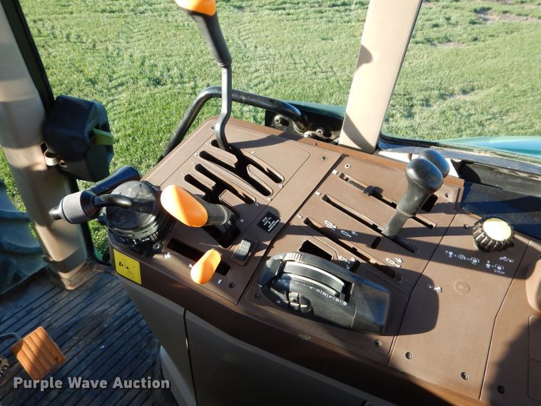 image for item DI8337 2004 John Deere 6715  MFWD tractor