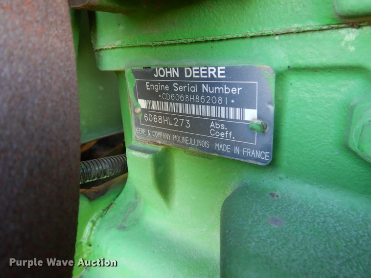 image for item DI8337 2004 John Deere 6715  MFWD tractor