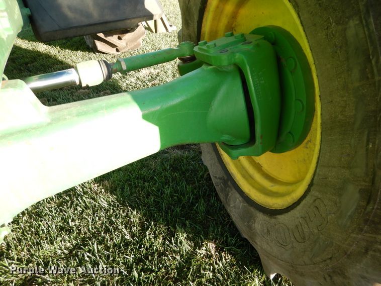 image for item DI8337 2004 John Deere 6715  MFWD tractor