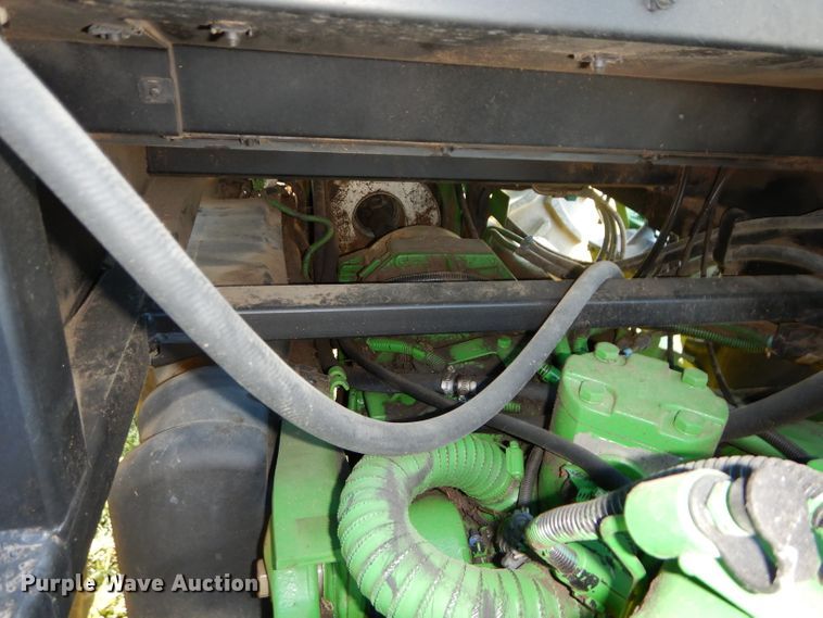 image for item DI8337 2004 John Deere 6715  MFWD tractor