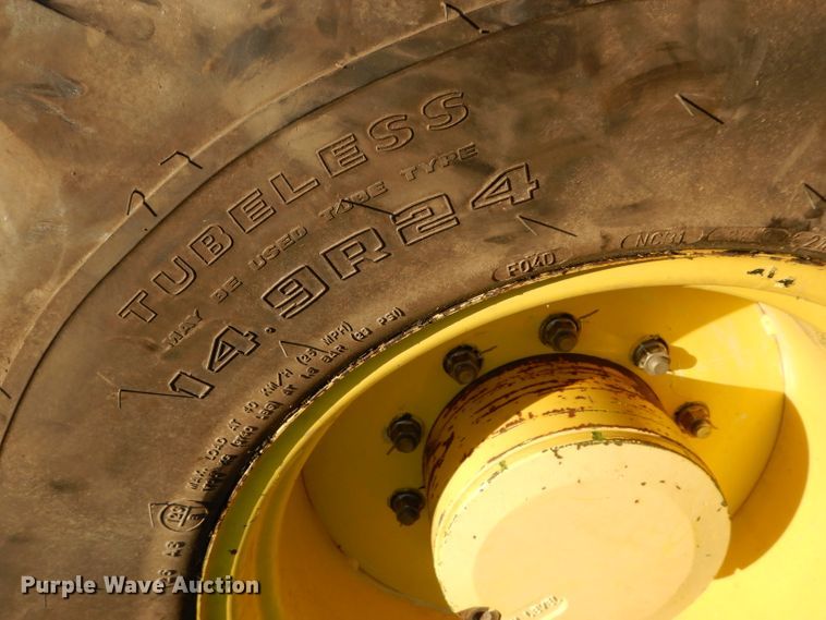 image for item DI8337 2004 John Deere 6715  MFWD tractor