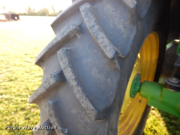 image for item DI8337 2004 John Deere 6715  MFWD tractor