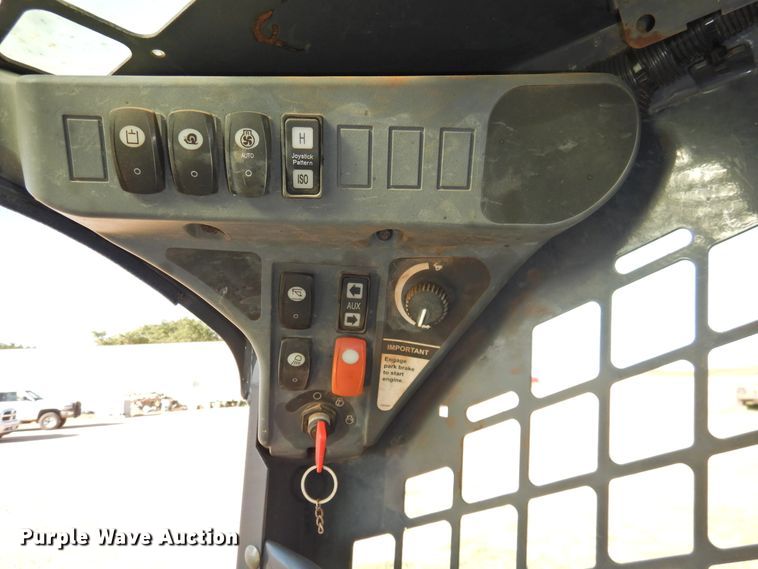 image for item DG1489 2012 John Deere 323D  tracked skid steer loader