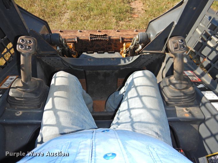 image for item DG1489 2012 John Deere 323D  tracked skid steer loader