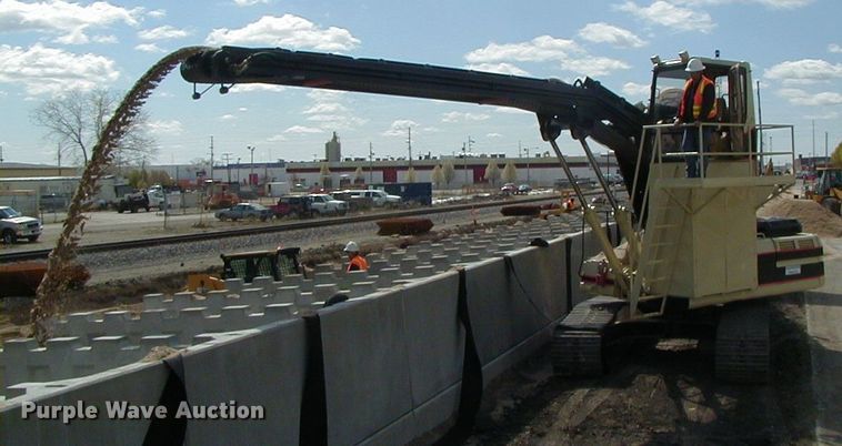 image for item DI7270 1990 Caterpillar 325C L  excavator with material placer