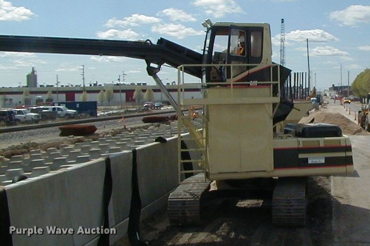 image for item DI7270 1990 Caterpillar 325C L  excavator with material placer