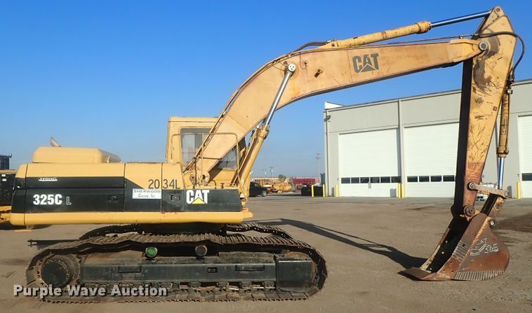 image for item DI7270 1990 Caterpillar 325C L  excavator with material placer