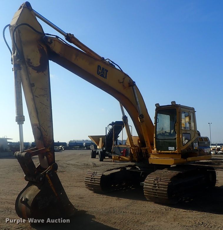 image for item DI7270 1990 Caterpillar 325C L  excavator with material placer