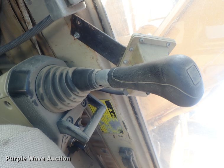 image for item DI7270 1990 Caterpillar 325C L  excavator with material placer