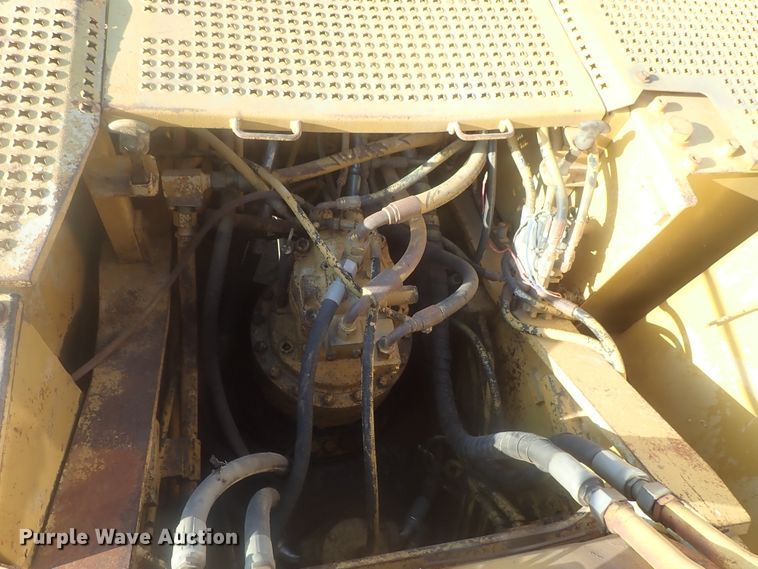 image for item DI7270 1990 Caterpillar 325C L  excavator with material placer