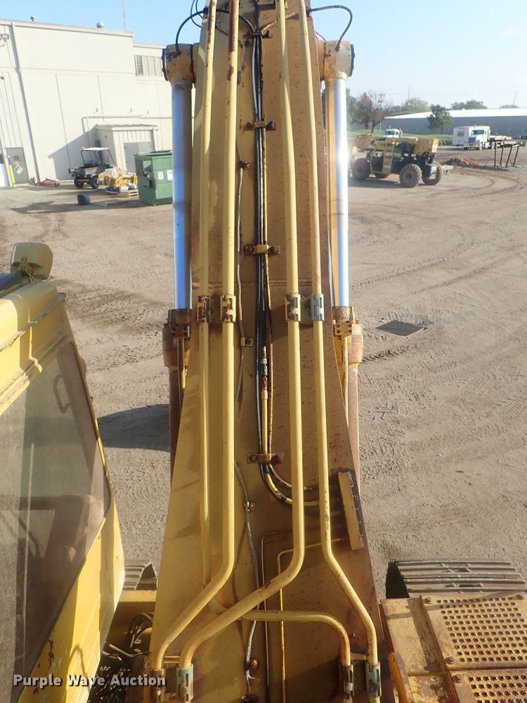 image for item DI7270 1990 Caterpillar 325C L  excavator with material placer