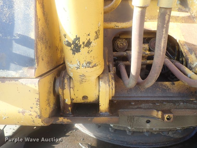 image for item DI7270 1990 Caterpillar 325C L  excavator with material placer