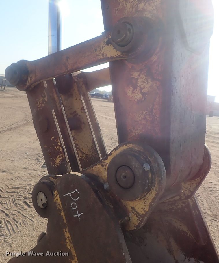 image for item DI7270 1990 Caterpillar 325C L  excavator with material placer