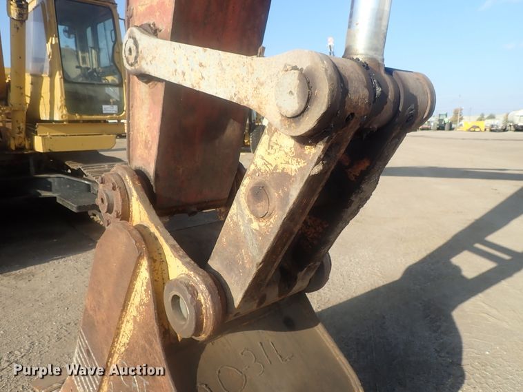 image for item DI7270 1990 Caterpillar 325C L  excavator with material placer