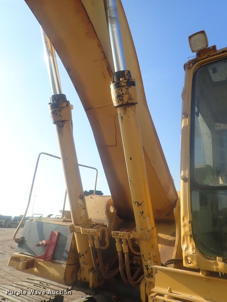 image for item DI7270 1990 Caterpillar 325C L  excavator with material placer