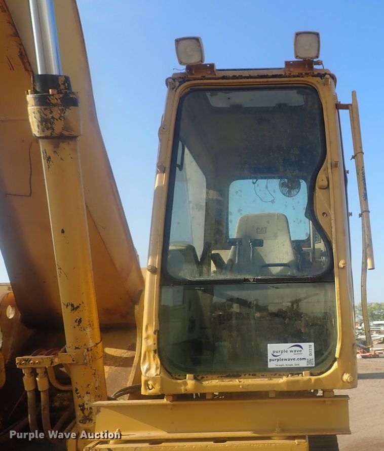 image for item DI7270 1990 Caterpillar 325C L  excavator with material placer