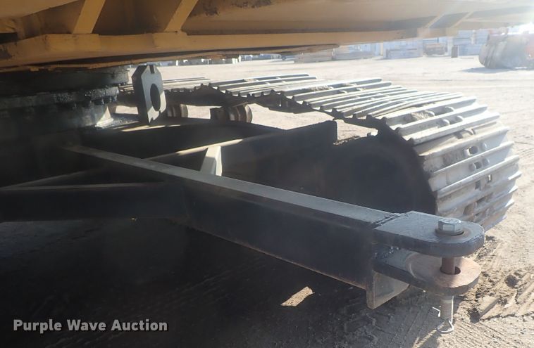 image for item DI7270 1990 Caterpillar 325C L  excavator with material placer