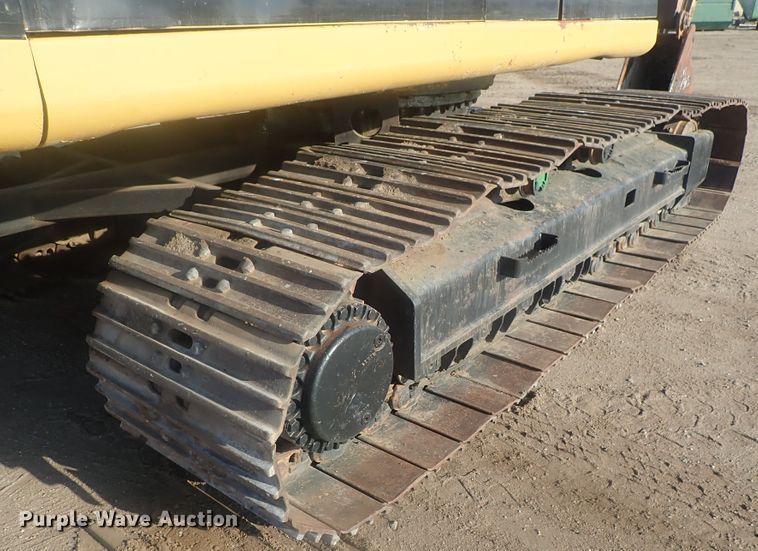 image for item DI7270 1990 Caterpillar 325C L  excavator with material placer