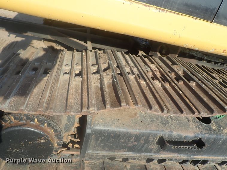 image for item DI7270 1990 Caterpillar 325C L  excavator with material placer