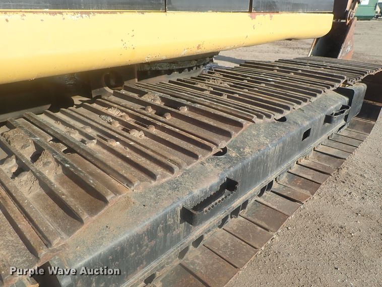 image for item DI7270 1990 Caterpillar 325C L  excavator with material placer