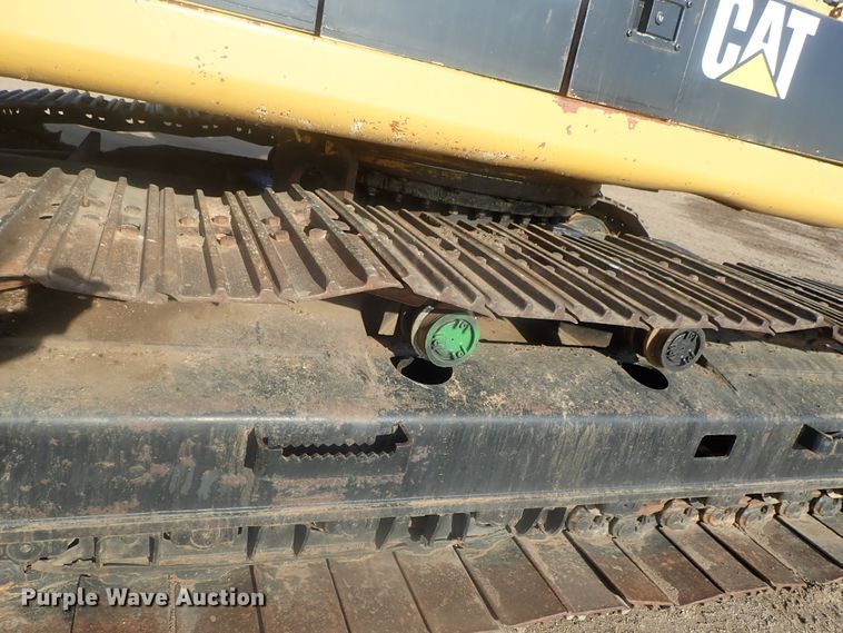 image for item DI7270 1990 Caterpillar 325C L  excavator with material placer