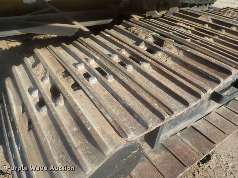 image for item DI7270 1990 Caterpillar 325C L  excavator with material placer