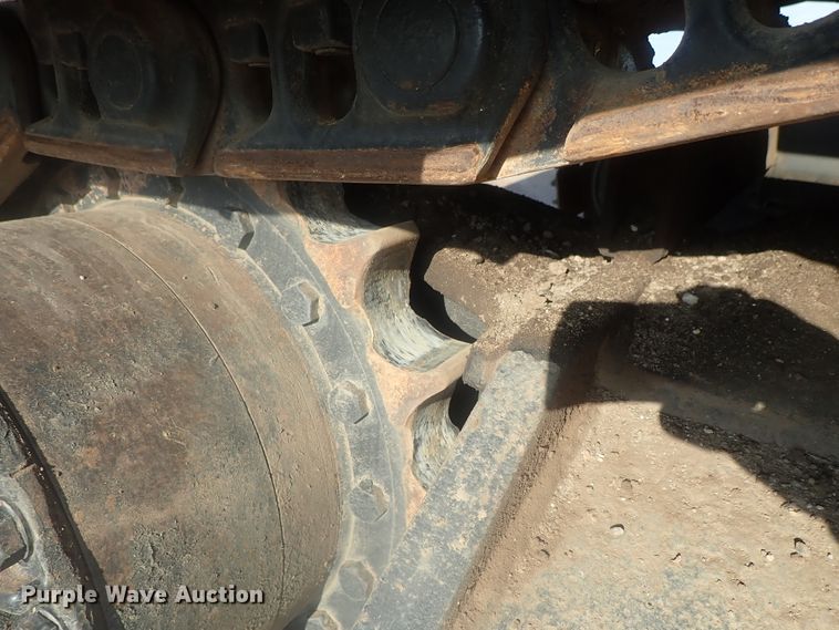 image for item DI7270 1990 Caterpillar 325C L  excavator with material placer